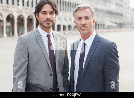 Portrait of confident businessmen in St. Mark's Square in Venice Stock Photo