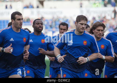 February 3rd 2013. Rome Italy. Six Nations rugby. Italy vs France. French team members jog round the pitch to warm up prior to kick off. L. to R. Frédéric Michalak; Fulgence Ouedraogo; Pascal Papé (Captain); Dimitri Szarzewski. Stock Photo