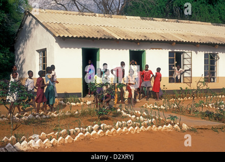 Zimbabwean boys and girls, boys, girls, children, schoolchildren, schoolboys, schoolgirls, village of Mahenye, Manicaland Province, Zimbabwe, Africa Stock Photo