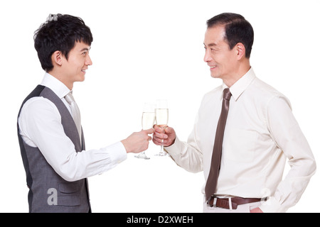 Businessmen with champagne flutes toasting Stock Photo