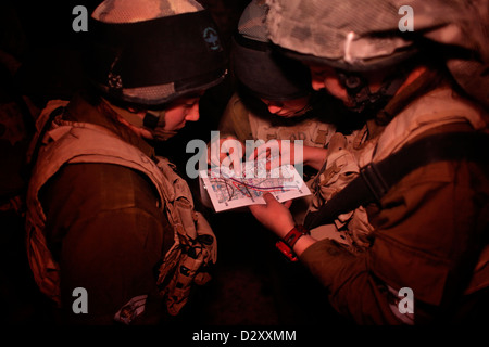 Israeli female soldiers from the Combat Intelligence Collection Corps taking part in a drill in the Negev desert close to the border with Egypt in Israel Stock Photo