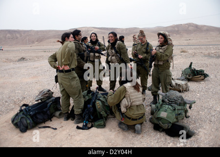 Israeli female soldiers from the Combat Intelligence Collection Corps taking part in a drill in the Negev desert close to the border with Egypt in Israel Stock Photo