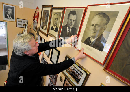 Glazier Dalibor Zabka shows official presidential portraits from his collection in Blansko, Czech Republic on February 4, 2013. Dalibor Zabka is an entusiastic collector of the official portraits of the Czechoslovak and later Czech presidents which were shown in officies and schools. (CTK Photo/Vaclav Salek) Stock Photo