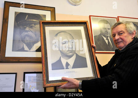Glazier Dalibor Zabka shows official presidential portrait of the Czechoslovak president Edvard Benes in Blansko, Czech Republic on February 4, 2013. Dalibor Zabka is an entusiastic collector of the official portraits of the Czechoslovak and later Czech presidents which were shown in officies and schools. (CTK Photo/Vaclav Salek) Stock Photo