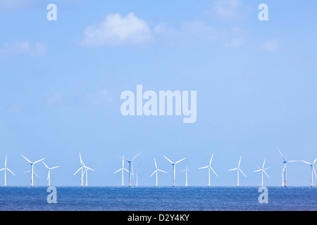 offshore windfarm with lots of windmills or wind turbines in the North Sea Skegness Lincolnshire coast England UK GB EU Europe Stock Photo