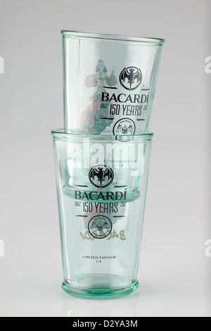 Two limited edition thick glass Bacardi glass tumblers celebrating 150 years of production 1862 to 2012 Stock Photo