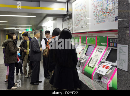 Tokyo, Japan, people are from vending machines in the lobby of Shinjuku Station Stock Photo