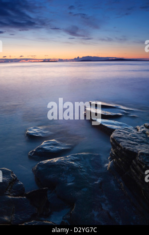 The coastline of the island of Shapinsay at sunset, Orkney Islands ...