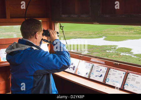 Birdwatching at Mill Dam RSPB reserve on the island of Shapinsay, Orkney Islands, Scotland. Stock Photo