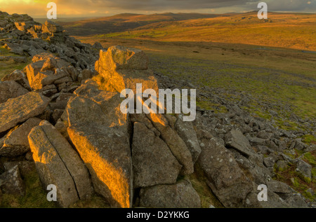 Transient evening golden light on Sharpitor in Dartmoor National Park Stock Photo