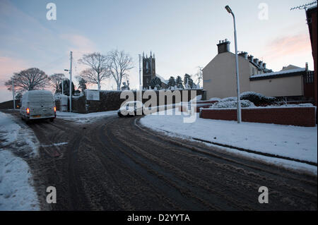 Newry, Northern Ireland, UK, 5th February 2013. Newry awakes to an unexpected snowfall this morning as drivers take to the roads cautiously. Stock Photo