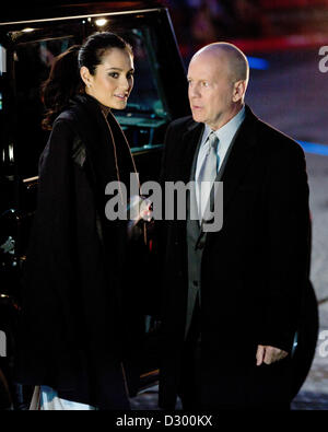Actor Bruce Willis and his wife Emma Heming-Willis arrive to the premiere of 'A Good Day to Die Hard' in Berlin, Germany, 04 February 2013. The fifth part of the action series hits German theaters on 14 February. PHOTO: BRITTA PEDERSEN Stock Photo