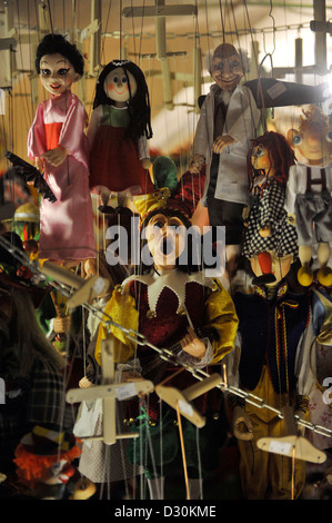 Puppets hanging in the window of a shop in Prague, Czech republic Stock Photo