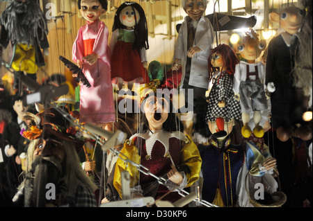 Puppets hanging in the window of a shop in Prague, Czech republic Stock Photo