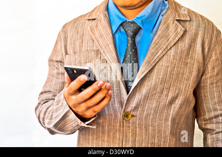 Business man working with phone on white background Stock Photo