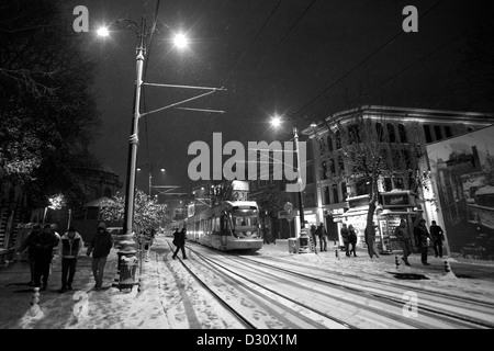 ISTANBUL TURKEY - Winter snowstorm scene in Divanyolu Caddesi, Cemberlitas district Stock Photo