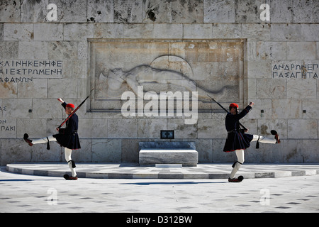 Presidential Guards (Evzones) performing in front of the Tomb of the Unknown Soldier, Athens, Greece. Stock Photo
