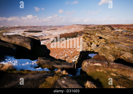 Looking North West from Robin Hoods Cave, Stanage Edge on a wintry morning in the Peak District National Park. Stock Photo