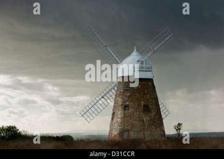 Halnaker Windmill after a storm on the South Downs with a view of Chichester Cathedral spire in West Sussex England UK Stock Photo