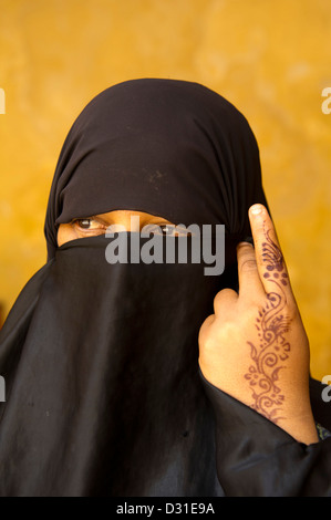 Swahili woman wearing a black bui-bui, Lamu, Lamu Archipelago, Kenya Stock Photo