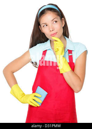 Beautiful young mixed race Caucasian / Chinese Asian cleaning woman thinking while looking at copyspace on white background Stock Photo