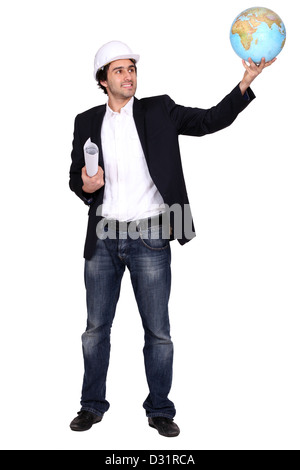An architect holding a globe up. Stock Photo