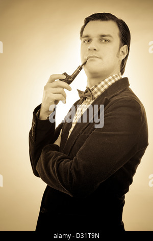 Retro portrait of a gentleman smoking pipe Stock Photo
