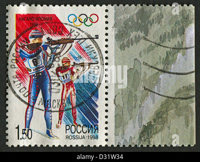 RUSSIA - CIRCA 1998: Postage stamps printed in Russia dedicated to XVIII Winter Olympic Games (1998) in Nagano, Japan, circa 1998. Stock Photo