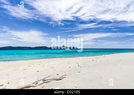 Wild beach and catamaran in Mitsio archipelago near Nosy Be in northern Madagascar Stock Photo