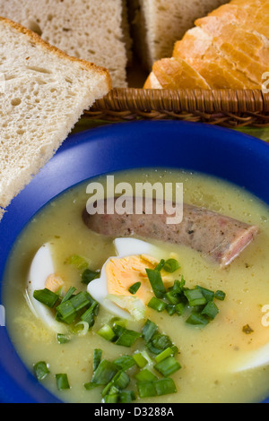 traditional polish white borscht with eggs and sausage Stock Photo