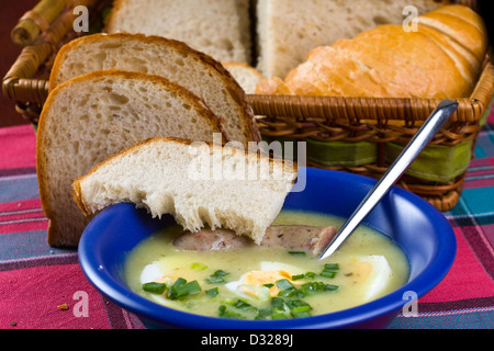 White borscht with eggs and white sausage Stock Photo