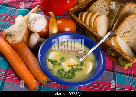White borscht with eggs and white sausage Stock Photo