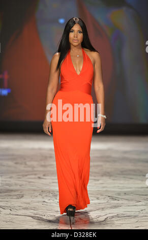 NEW YORK, NY - FEBRUARY 06: Toni Braxton wearing Herve L. Leroux walks the runway at The Heart Truth's Red Dress Collection during Fall 2013 Mercedes-Benz Fashion Week at Hammerstein Ballroom on February 6, 2013 in New York City. Stock Photo