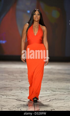 NEW YORK, NY - FEBRUARY 06: Toni Braxton wearing Herve L. Leroux walks the runway at The Heart Truth's Red Dress Collection during Fall 2013 Mercedes-Benz Fashion Week at Hammerstein Ballroom on February 6, 2013 in New York City. Stock Photo