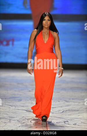 NEW YORK, NY - FEBRUARY 06: Toni Braxton wearing Herve L. Leroux walks the runway at The Heart Truth's Red Dress Collection during Fall 2013 Mercedes-Benz Fashion Week at Hammerstein Ballroom on February 6, 2013 in New York City. Stock Photo