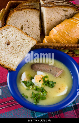 traditional polish white borscht with eggs and sausage  Stock Photo