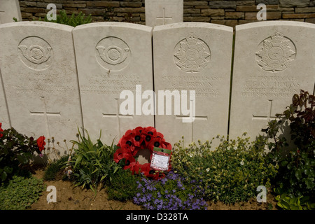 Poppy wreath laid in Ten Tree Alley British cemetery on the Somme containing 70 graves from the battles of 1916 First World War Stock Photo