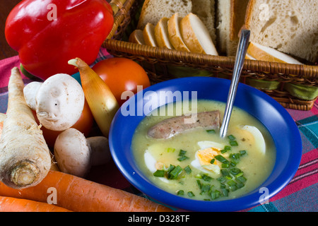 traditional polish white borscht with eggs and sausage  Stock Photo