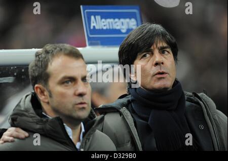 Germany's assistant coach Hans-Dieter Flick (L) and head coach Joachim Loew prior to the international friendly soccer match France vs. Germany at the Stade de France in Paris, France, 06 February 2013. Photo: Andreas Gebert/dpa Stock Photo