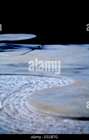 A lovely background image of a marbled granite pavement in a S shaped pattern with a bumpy texture and stone smoothness. Stock Photo