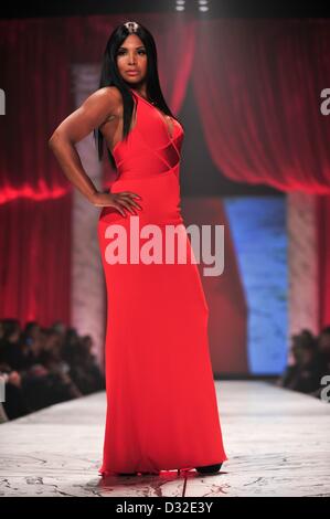 Toni Braxton on the runway for The Heart Truth's Red Dress Collection Runway Fashion Show, Hammerstein Ballroom, New York, NY February 6, 2013. Photo By: Gregorio T. Binuya/Everett Collection Stock Photo