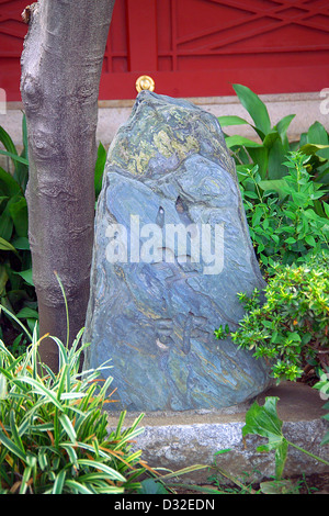 Monument to the character Hachigoro (Gara Hachi) from the jidaigeki Zenigata Heiji. Kanda Myojin Shrine, Bunkyo-ku, Tokyo, Japan Stock Photo