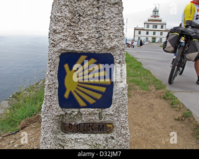Cyclist at Kilometer zero,Faro de Fisterra,lighthouse,Cabo de Fisterra,Way of St. James,Cape Finistere,La Coruna province,Galici Stock Photo