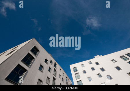 white apartment blocks and blue sky, norwich, norfolk, england Stock Photo