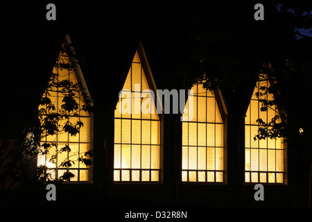 Illuminated windows of St Marys Star Of The Sea Roman Catholic Parish Church, Largs, North Ayrshire, Scotland, UK Stock Photo