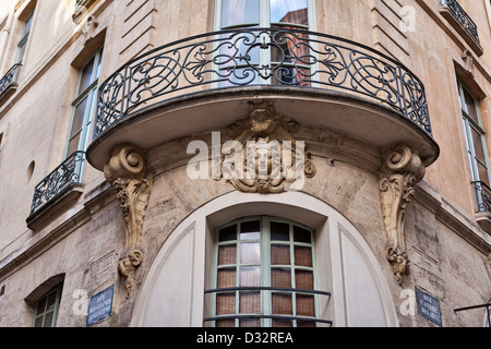 Ornate balcony at the junction of Rue des Grands Augustins and Rue Saint-André des Arts, Paris, France Stock Photo