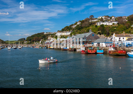 Small ferry carrying passengers across the River Looe from East Looe. Stock Photo