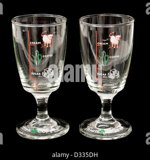 Pair of Irish coffee glasses with markings for whiskey, sugar, cream and coffee Stock Photo