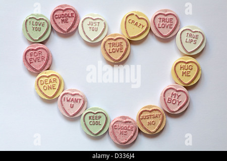 sweetheart sweet heart - Love heart sweets with messages, arranged in a heart shape for Valentines day, Valentine day - loveheart sweets from above Stock Photo