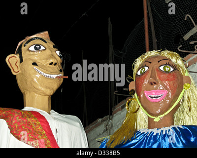 giant papier mache heads folk art los gigantes puppet dancers procession in honor of La Virgen de la Candelaria Oaxaca Mexico Stock Photo